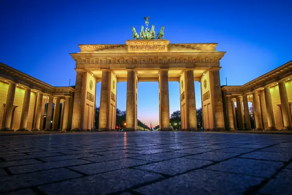 The Brandenburg Gate lit up at dusk, Berlin
